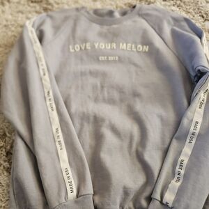 Love Your Melon Light Blue Crewneck Sweatshirt with White Sleeve Tape